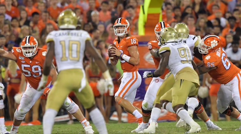 Clemson quarterback Trevor Lawrence (16) prepares to pass in the first half at Memorial Stadium on the Clemson campus Thursday, August 29, 2019. Georgia Tech took the field for the first time with Geoff Collins as head coach. (Hyosub Shin / Hyosub.Shin@ajc.com)