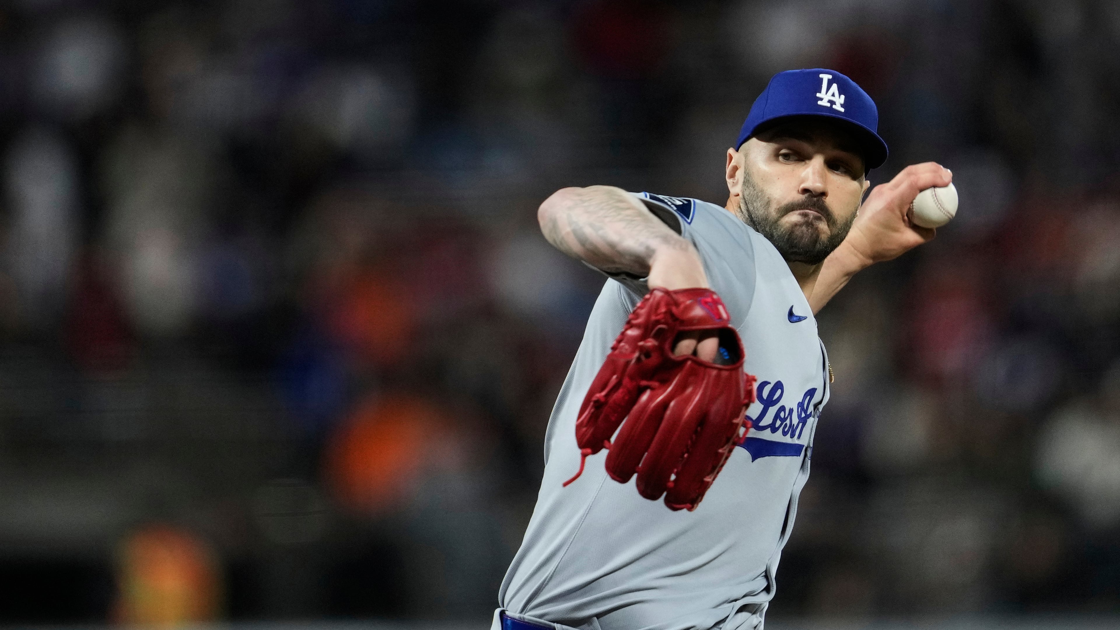 Los Angeles Dodgers pitcher Tanner Scott throws to a San Francisco Giants batter during the ninth inning of a baseball game Saturday, Sept. 13, 2025, in San Francisco. (AP Photo/Godofredo A. Vásquez)