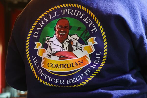 Daryll Triplett rehearses for a comedy show at Uptown Comedy Corner in Atlanta on Monday, June 30, 2025. Triplett, a retired Georgia police officer turned stand-up comic, hopes to improve cop-community relationships through his nonprofit All Cops Ain’t Bad. (Abbey Cutrer / AJC)