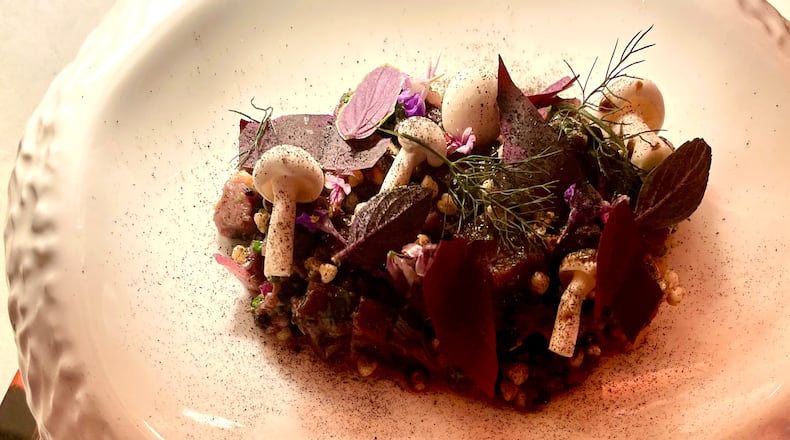 Venison tartare is a woodsy dish served at Avize in west Midtown. (Angela Hansberger for The Atlanta Journal-Constitution)