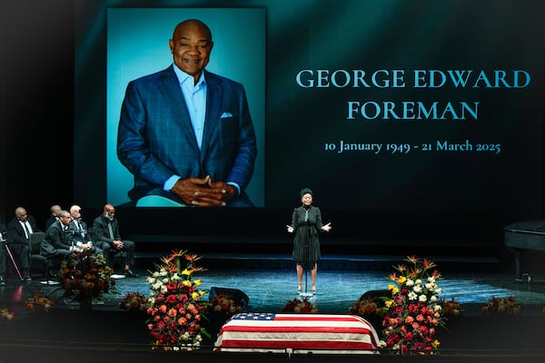 Dana Clark Green sings "Precious Lord" during a memorial service for Olympic and world champion boxer and minister George Foreman at Wortham Theater Center in Houston, Monday, April 14, 2025. (Brett Coomer/Houston Chronicle via AP)
