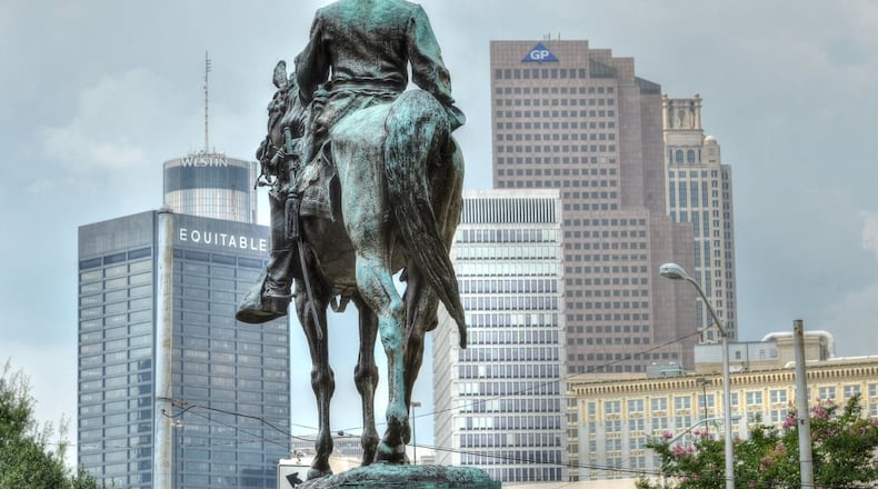 The statue of Confederate Maj. Gen. John Brown Gordon, who later became a U.S. senator and governor of Georgia, appears to ride into the an uncertain and modern future, still clad in his military uniform. Gordon was also head of the Ku Klux Klan in Georgia after the Civil War. CHRIS HUNT/SPECIAL