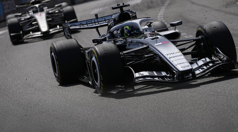 Mexico's Sergio Perez steers his Cadillac during the Formula One Monaco Grand Prix race at the Monaco racetrack, Sunday, June 7, 2026. (AP Photo/Fatima Shbair)