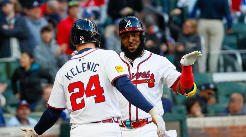 Atlanta Braves designated hitter Marcell Ozuna celebrates with outfielder Jarred Kelenic (24) after hitting a three-run home run during the first inning against the Texas Rangers at Truist Park on Sunday, April 21, 2024, in Atlanta.
(Miguel Martinez/ AJC)