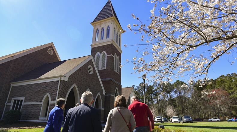 Attendees arrive for a district gathering of the United Methodist Church, held Sunday at Kennesaw United Methodist Church. CONTRIBUTED BY JOHN AMIS