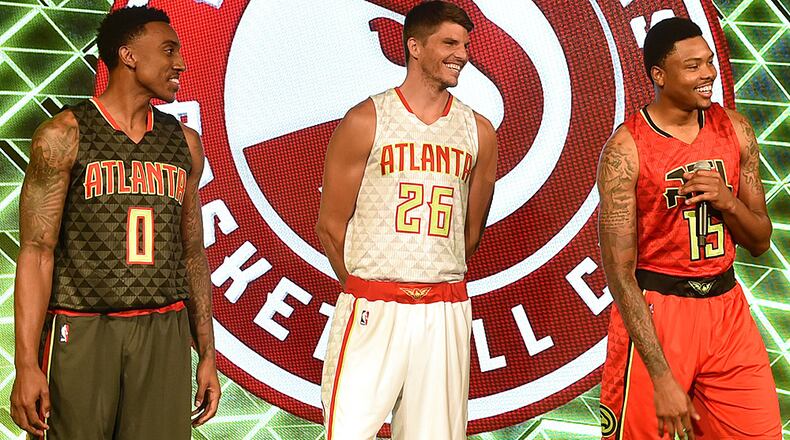 June 24, 2105 Atlanta: The Atlanta Hawks unveil their new uniforms at a press conference Wednesday at Philips Arena. Road uniform on the left, home uniform in the center, alternate road uniform on the right. BRANT SANDERLIN/BSANDERLIN@AJC.COM
