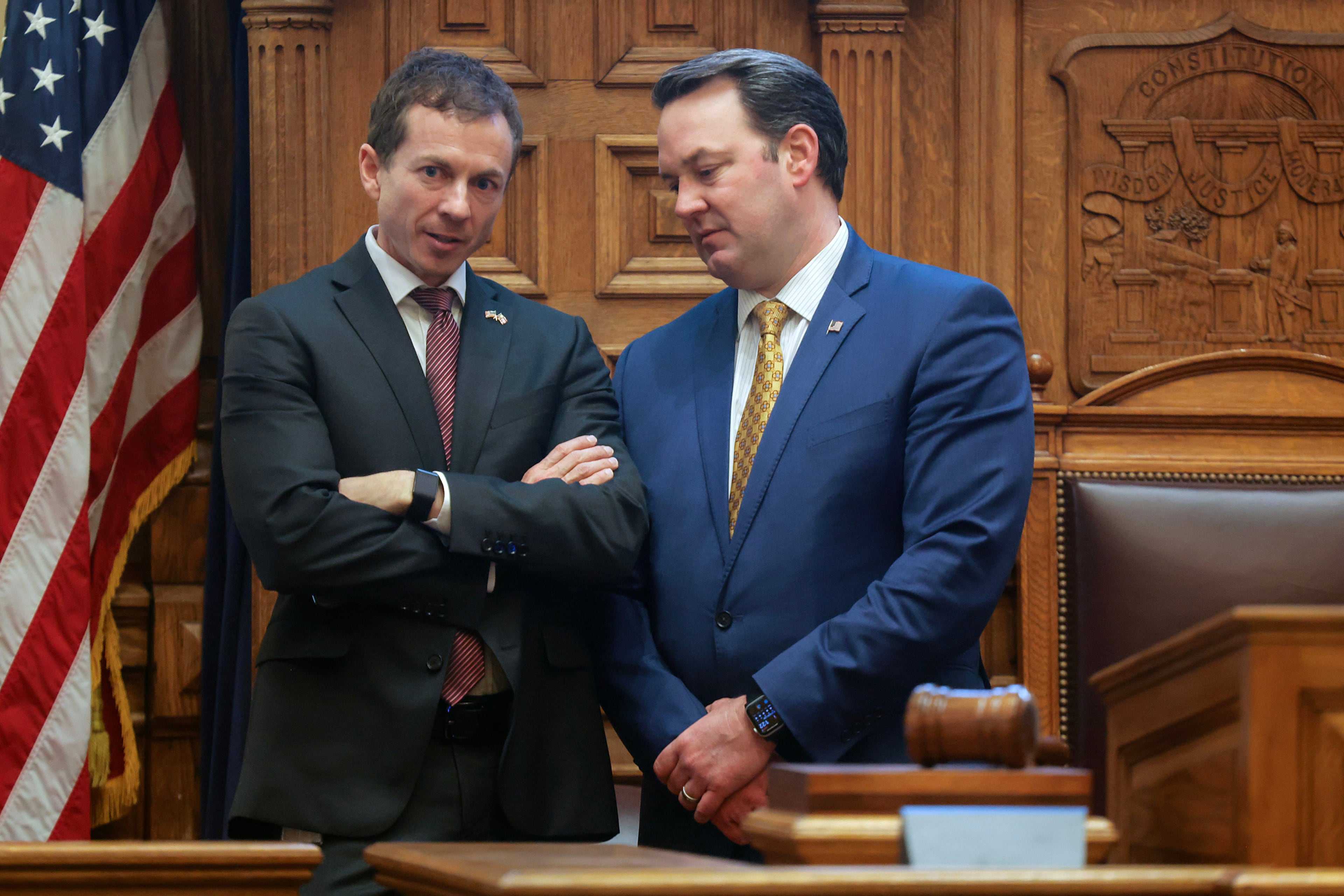 State Sen. Greg Dolezal (Left), R-Cumming, chats with Lt. Gov. Burt Jones in the Senate chambers during the legislative session at the State Capitol on March 1, 2023. (Natrice Miller/AJC/TNS)