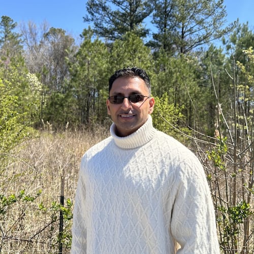 Sonny Bharadia, who spent more than two decades behind bars for a 2001 crime he did not commit, is suing the small town of Thunderbolt and the two law enforcement officers who handled his case.