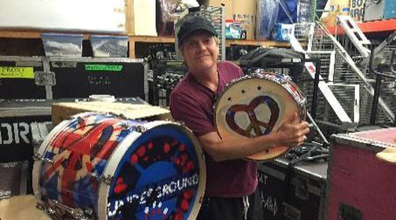 Rick Allen with some of his painted drum artwork.