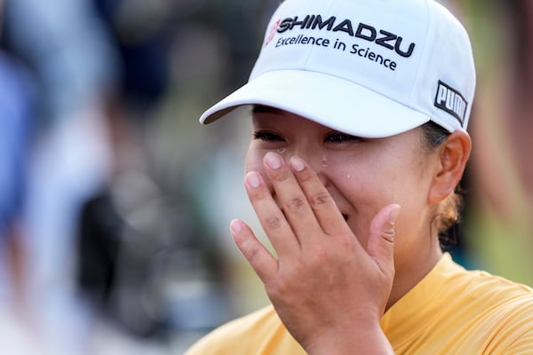 Mao Saigo, of Japan, celebrates winning the Chevron Championship LPGA golf tournament Sunday, April 27, 2025, in The Woodlands, Texas. (AP Photo/Ashley Landis)
