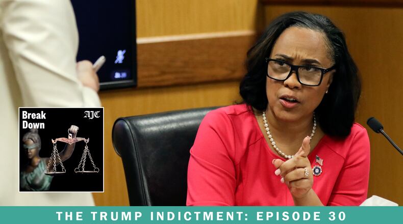 Fulton DA Fani Willis is cross examined by defense attorney Ashleigh Merchant during a dramatic hearing to determine whether Willis should be removed from the Georgia election interference trial. The latest episode of the AJC's Breakdown podcast summarizes the day's activity and considers the stakes going forward. (Alyssa Pointer/AP)