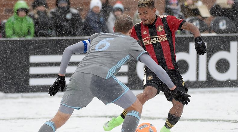 Atlanta United's Josef Martinez controls the ball against Vladim Demidov of Minnesota United during the second half of a snow-filled match March 12, 2017 at TCF Bank Stadium in Minneapolis.