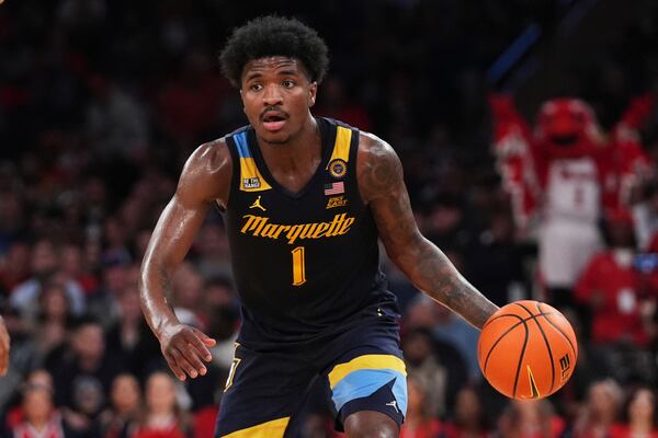 FILE - Marquette's Kam Jones (1) looks to pass during the second half of an NCAA college basketball game against the St. John's in the semifinals of the Big East tournament, on March 14, 2025, in New York. (AP Photo/Frank Franklin II, File)