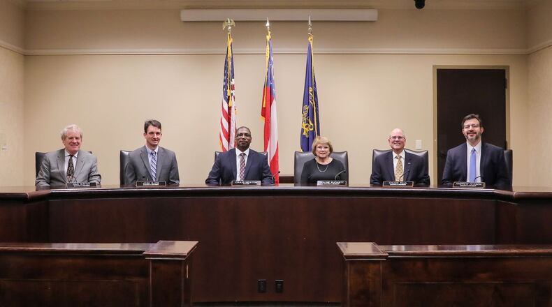 The Norcross City Council l-r: Council Members Dan Watch, Josh Bare, Mayor Craig Newton, and Council Members Elaine Puckett, Chuck Paul and Andrew Hixson. (Courtesy City of Norcross)