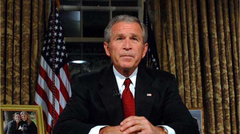 Former President George W. Bush criticized the Western withdrawal from Afghanistan in an interview with a German broadcaster released Wednesday, saying he fears that Afghan women and girls will “suffer unspeakable harm.” (AJC file photo)