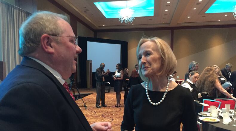 Fellow 2016 Atlanta Press Club Hall of Fame inductees Judy Woodruff and Budd McEntee talk after the ceremony November 30, 2016. CREDIT: Rodney Ho/ rho@ajc.com