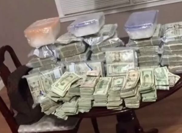 Nearly $750,000, three kilos of meth and cocaine were seized from alleged drug traffickers in Newnan on Monday. (Credit: Channel 2 Action News)