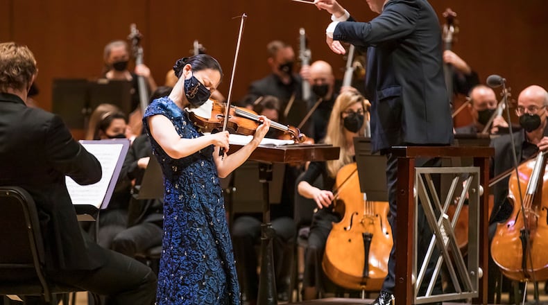 Guest conductor Juanjo Meja leads Midori and the Atlanta Symphony Orchestra in the Tchaikovsky violin concerto. Courtesy of Rafterman