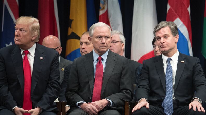 From left, President Donald Trump, Attorney General Jeff Sessions and FBI Director Christopher Wray. (Tom Brenner/The New York Times)