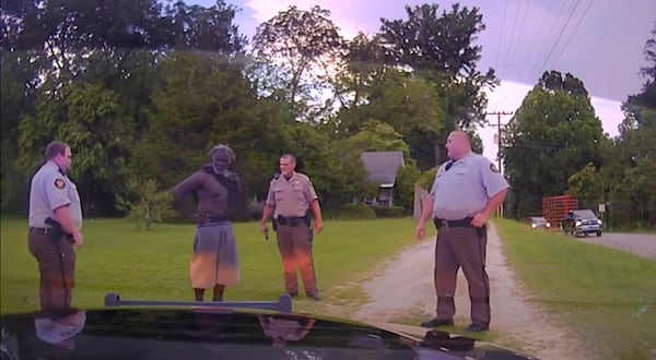Washington County Deputies Rhett Scott (from left), Henry Copeland and Michael Howell stop Eurie Martin while he walks to his sister's house on July 7, 2017. Moments later, Martin is shocked with a Taser, as seen in this video obtained from the Washington County Superior Court by Georgia Public Broadcasting News. (Courtesy Georgia Public Broadcasting)