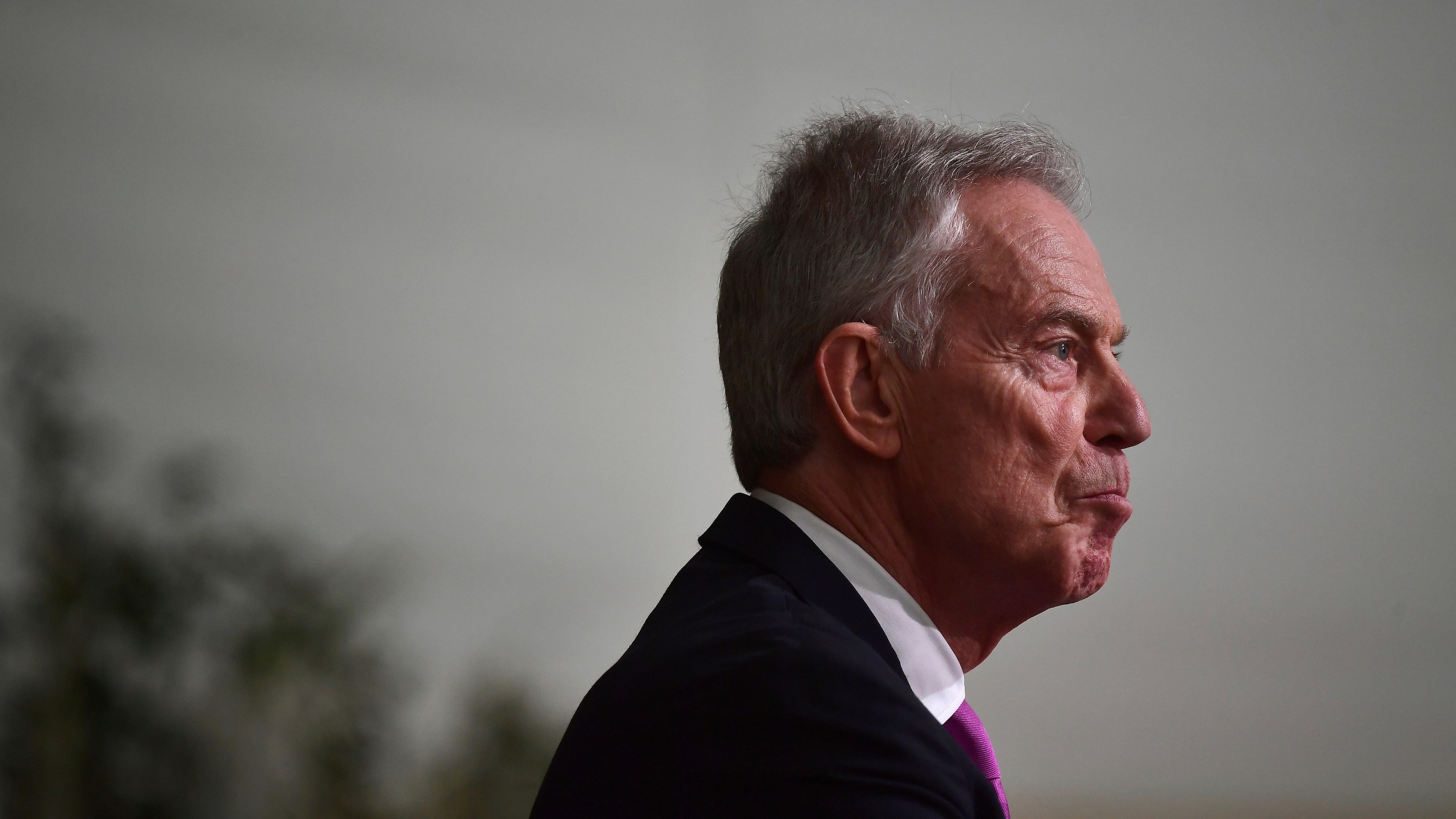 FILE - Former British Prime Minister Sir Tony Blair reacts as he gives a speech at Hillsborough Castle for the Gala dinner to mark the 25th anniversary of the Belfast/Good Friday Agreement, in Belfast, Northern Ireland, April 19, 2023. (Charles McQuillan/Pool Photo via AP, File)