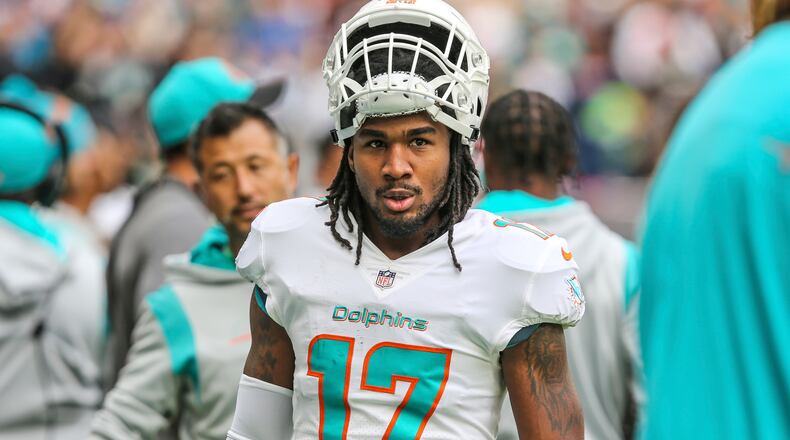 Miami Dolphins wide receiver Jaylen Waddle (17) walks the sideline before game against the Jacksonville Jaguars Sunday, Oct. 17, 2021, at Tottenham Hotspur Stadium in London. (Gary McCullough/AP)
