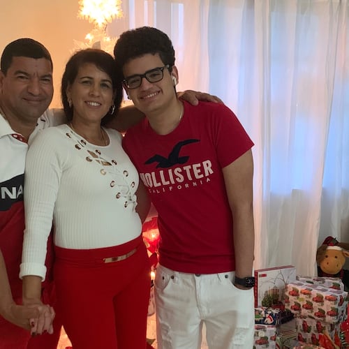 This undated photo provided by the family of Yoel Rodriguez Naranjo via Morgan & Morgan on Wednesday, Sept. 9, 2026, shows Naranjo, left, with his wife and son. (Family/Morgan & Morgan via AP)
