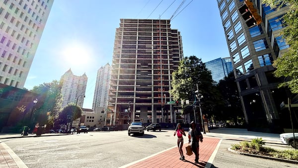 The Campanile building at the corner of Peachtree and 14th streets as seen earlier this month. Developer John Dewberry has proposed a significant overhaul to the tower, which he has dubbed the Midtowne, a project that has stalled with little visible progress for several years. It has drawn the ire of Midtown residents and efforts by the city to prod development. (J. Scott Trubey/AJC)