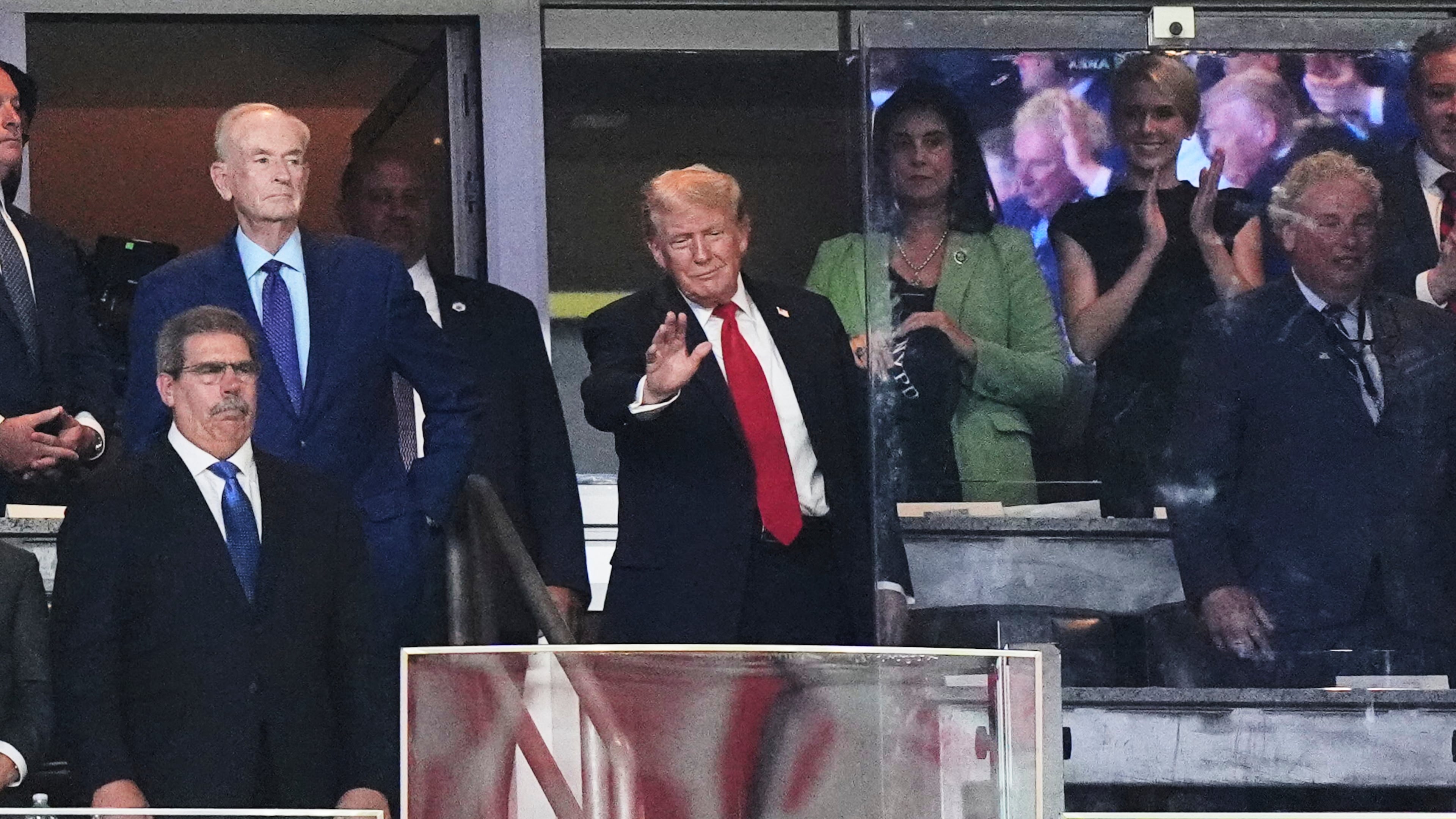 President Donald Trump gestures to people during the seventh inning of a baseball game between the New York Yankees and the Detroit Tigers Thursday, Sept. 11, 2025, in New York. (AP Photo/Frank Franklin II)