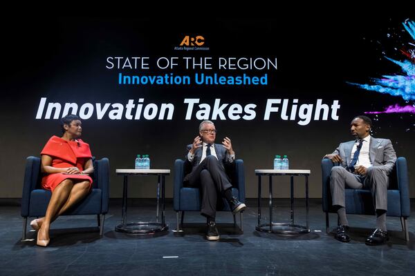 Delta CEO Ed Bastian (center), appears alongside Atlanta Mayor Andre Dickens (right), and Atlanta Regional Commission executive director and CEO Anna Roach at the ARC State of the Region event on Oct. 24, 2025. (Courtesy of the Atlanta Regional Commission)