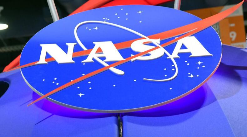 The NASA logo is displayed at the agency's booth during CES 2018 at the Las Vegas Convention Center on January 11, 2018 in Las Vegas, Nevada.