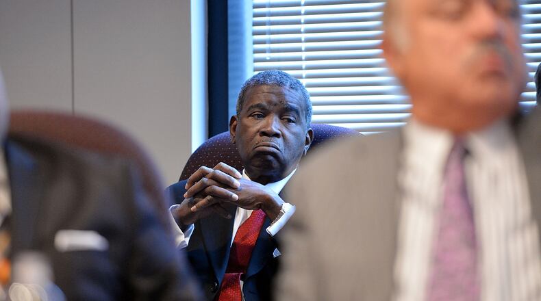 Tax Commissioner Arthur Ferdinand listens as Rome activist George Anderson outlines his complaints before the board. The Fulton County Ethics Board met to hear a trio of complaints involving Tax Commissioner Arthur Ferdinand.