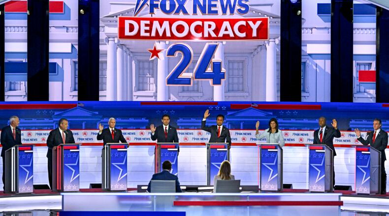 Candidates filled the stage in August during the first Republican presidential primary debate at the Fiserv Forum in Milwaukee. From left: former Arkansas Gov. Asa Hutchinson, former New Jersey Gov. Chris Christie, former Vice President Mike Pence, Gov. Ron DeSantis of Florida, the entrepreneur Vivek Ramaswamy, former South Carolina Gov. Nikki Haley, Sen. Tim Scott (R-S.C) and Gov. Doug Burgum of North Dakota. Many of those candidates are still on the ballot for the Georgia primary on March 12 even though they are no longer running. (Kenny Holston/The New York Times).