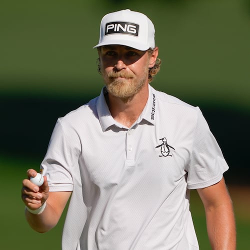 Kristoffer Reitan, of Norway, waves after a birdie on the 15th hole during the final round of the Truist Championship golf tournament at the Quail Hollow Club, Sunday, May 10, 2026, in Charlotte, N.C. (AP Photo/Chris Carlson)