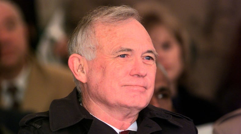 Tom Moreland listens to speakers at the dedication of the Dan Altobelli bridge over I-75 in Cobb County in 1997. (AJC Staff Photo/John Spink)