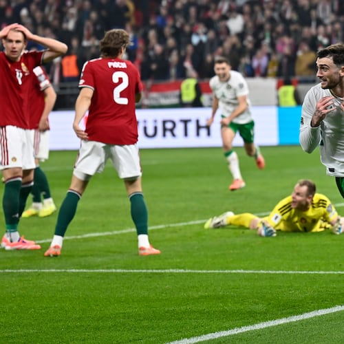 Ireland's Troy Parrott, right, celebrates after scoring his side's third goal during the World Cup 2026 group F qualifying soccer match between Hungary and Ireland in Budapest, Hungary, Sunday, Nov. 16, 2025. (AP Photo/Denes Erdos)