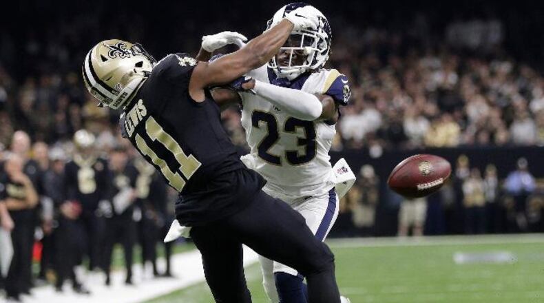 Los Angeles Rams' Nickell Robey-Coleman breaks up a pass intended for New Orleans Saints' Tommylee Lewis during the second half of the NFL football NFC championship game, Sunday, Jan. 20, 2019, in New Orleans.
