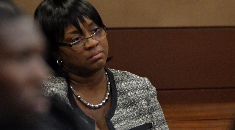 Defendant Tamara Cotman, a former regional director, was acquitted last year on a charge of influencing a witness.
