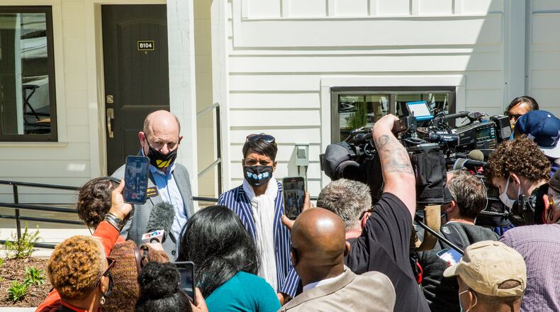 Mayor Keisha Lance Bottoms speaks to reporters after the formal ribbon-cutting at a new affordable housing complex for Westside residents.  (Jenni Girtman for The Atlanta Journal-Constitution)