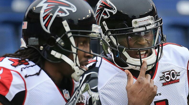 While Julio Jones' (right) season started with a bang, Roddy White (left) faded in background.