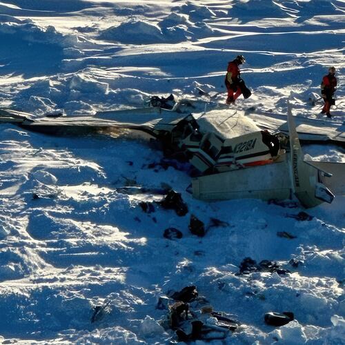 FILE - This photo provided by the U.S. Coast Guard on Feb. 7, 2025, shows a small commuter plane that crashed in western Alaska on a flight that was bound for the hub community of Nome. (U.S. Coast Guard via AP, File)