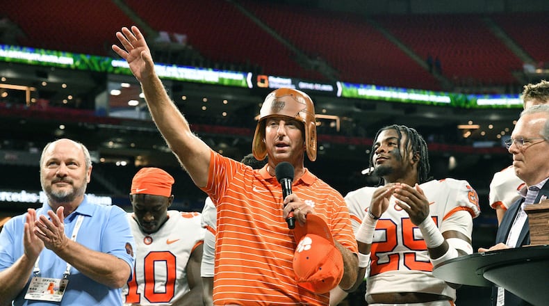 Clemson head coach Dabo Swinney celebrates the team's victory over Georgia Tech in the 2022 Chick-fil-A Kickoff Game at Mercedes-Benz Stadium in Atlanta on Monday, Sept. 5, 2022. Clemson won 41-10 over Georgia Tech. (Hyosub Shin/The Atlanta Journal-Constitution/TNS)
