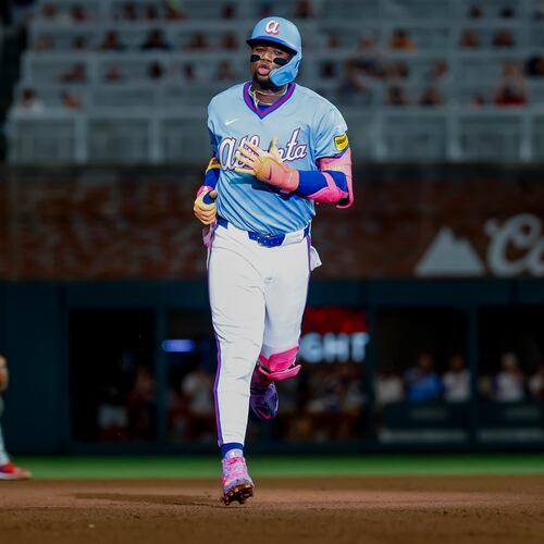Atlanta Braves' Ronald Acuña Jr. rounds the bases after hitting a solo home run against the Philadelphia Phillies during the fourth inning of a baseball game, Saturday, Sept. 12, 2026, in Atlanta. (AP Photo/Erik S. Lesser)