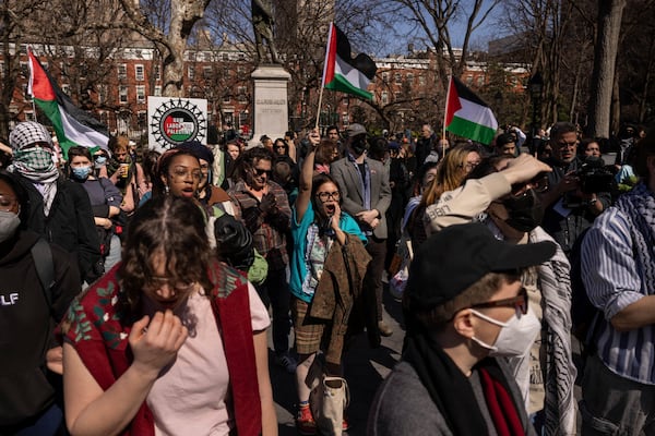 A protester including students of New York University gather for a demonstration in support of Palestinian activist Mahmoud Khalil at Washington Square Park, Tuesday, March 11, 2025, in New York. (AP Photo/Yuki Iwamura)
