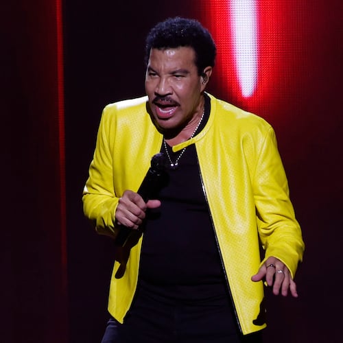 Lionel Richie performs at State Farm Arena on Sunday, July 19, 2026, in a joint concert with Earth, Wind & Fire. Richie started his show singing iconic hits "Hello," "Running with the Night" and "Easy." (Akili-Casundria Ramsess for the AJC)