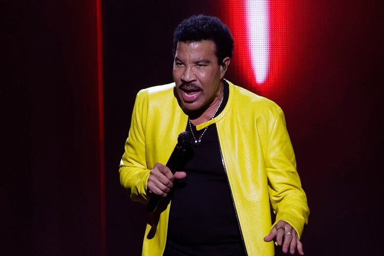 Lionel Richie performs at State Farm Arena on Sunday, July 19, 2026, in a joint concert with Earth, Wind & Fire. Richie started his show singing iconic hits "Hello," "Running with the Night" and "Easy." (Akili-Casundria Ramsess for the AJC)