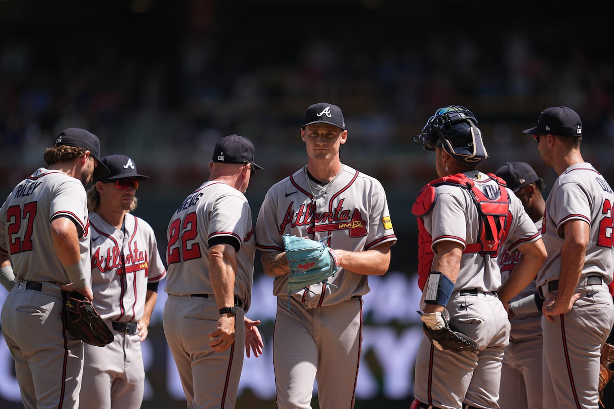 Braves starting pitcher AJ Smith-Shawver (center) leaves the game Wednesday, Aug. 19, 2026, in the fifth inning against the Twins in Minneapolis. Smith-Shawver allowed four runs on five hits and three walks in 4⅓ innings. (Abbie Parr/AP)