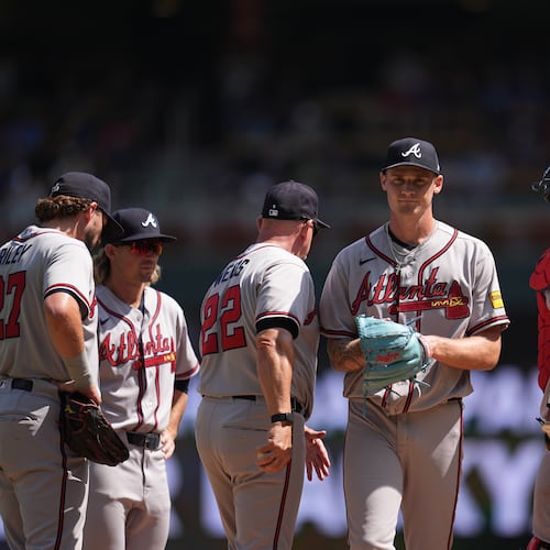 Braves starting pitcher AJ Smith-Shawver (center) leaves the game Wednesday, Aug. 19, 2026, in the fifth inning against the Twins in Minneapolis. Smith-Shawver allowed four runs on five hits and three walks in 4⅓ innings. (Abbie Parr/AP)