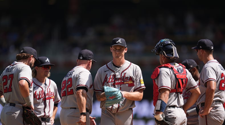 Braves starting pitcher AJ Smith-Shawver (center) leaves the game Wednesday, Aug. 19, 2026, in the fifth inning against the Twins in Minneapolis. Smith-Shawver allowed four runs on five hits and three walks in 4⅓ innings. (Abbie Parr/AP)