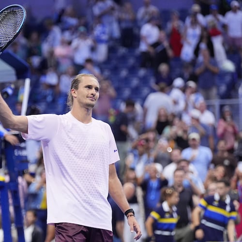 Alexander Zverev, of Germany, acknowledges fans after defeating Lorenzo Sonego, of Italy, in five sets in the first round of the U.S. Open tennis championships early Wednesday, Sept. 2, 2026, in New York. (AP Photo/Frank Franklin II)